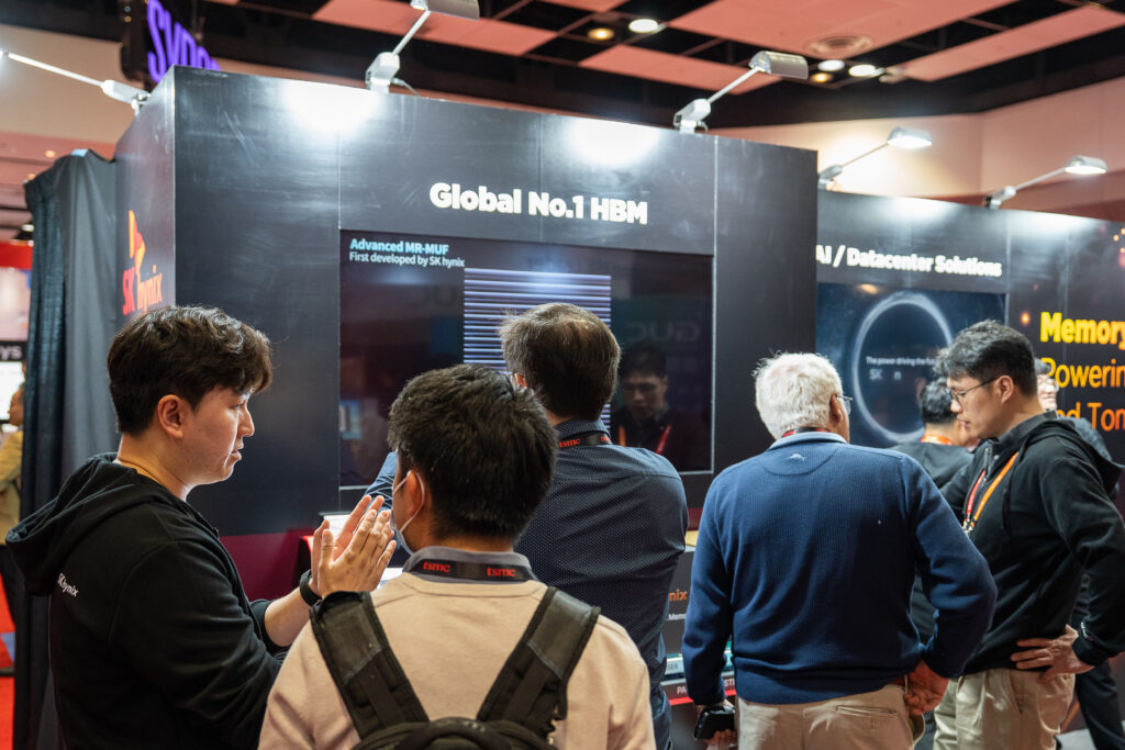 Visitors gather at SK hynix’s booth to see the latest memory innovations