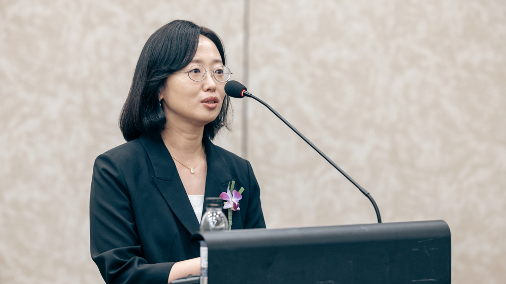 Son gives an acceptance speech at the awards ceremony