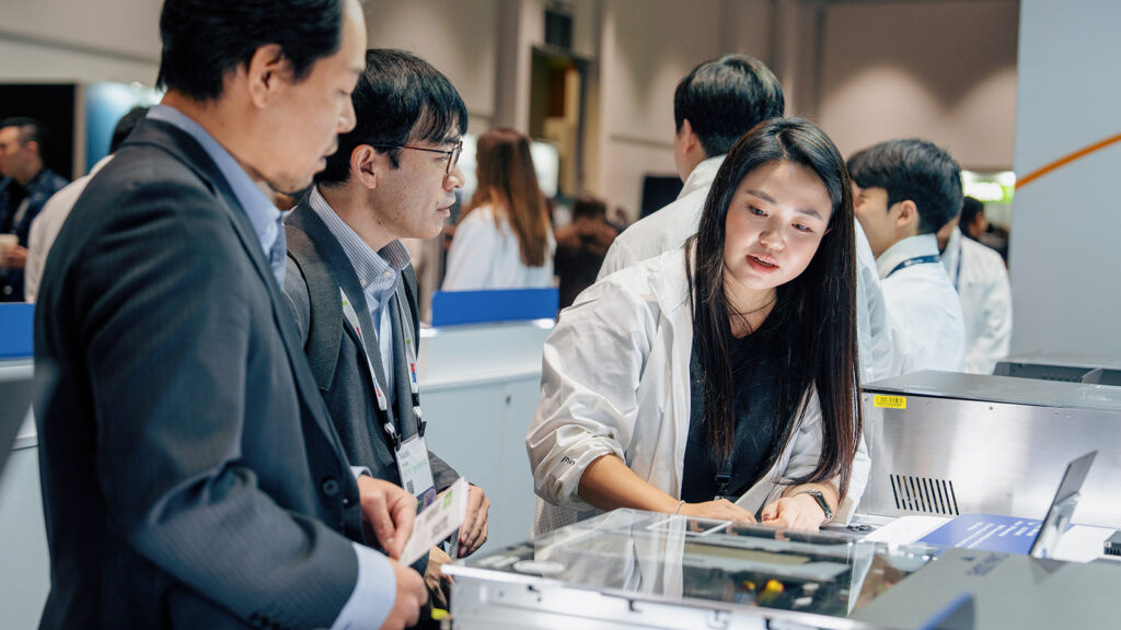 Visitors gather at SK hynix’s booth