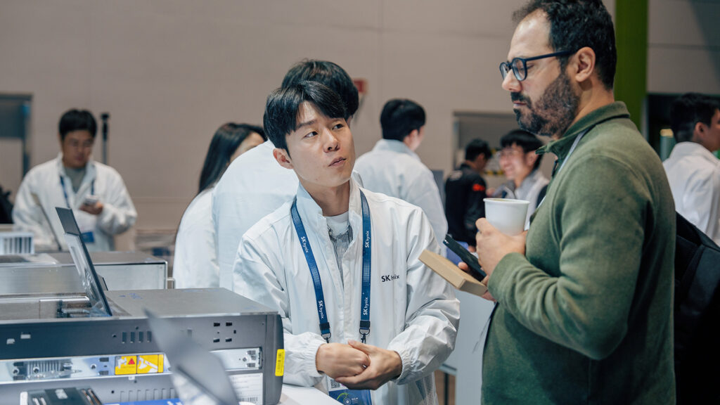 Visitors gather at SK hynix’s booth