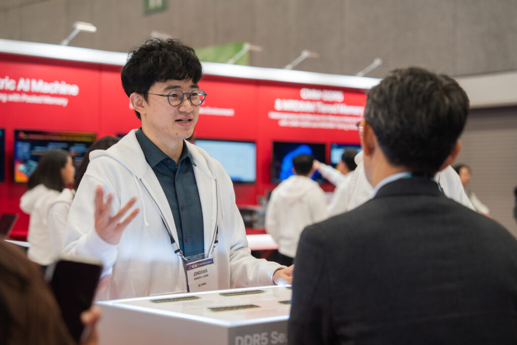Visitors exploring the SK hynix booth